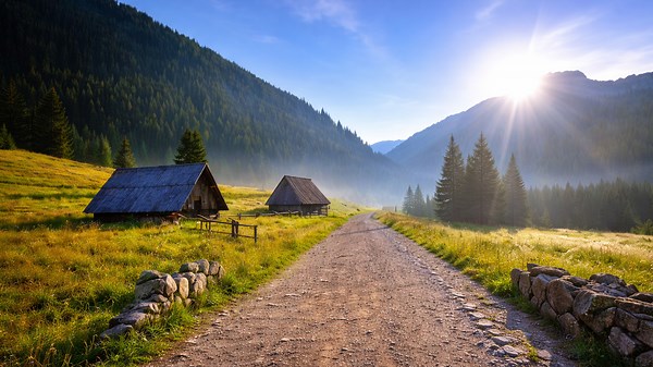 The mountain region where cabins sit below the peaks