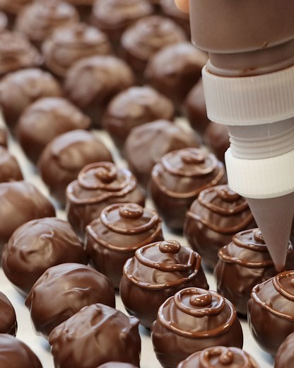 149K views · 664 reactions | Take a sneak peek inside a chocolate factory! You have to experience the new Cocoa Dolce Artisan Chocolates in Wichita's Old Town Entertainment District. You get a front row seat to watch them make all their chocolates, candies, desserts and pastry’s. Even the lounge area is cool with a fun and modern layout and huge display case for all their chocolates! | Visit Wichita | Facebook