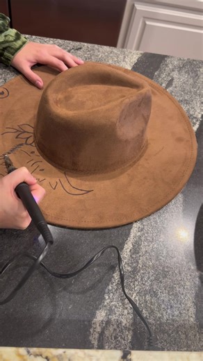Burning a custom hat from start to finish 🔥 Hand-drawn. Hand-burned. Made just for you. Would you choose florals or western scrollwork? 👀 #HatBurning #CustomHat #WesternAesthetic #BohoWestern #ShopSmall