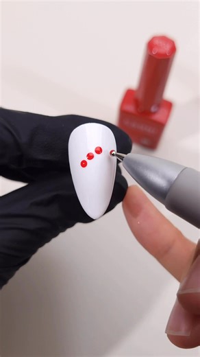 Candy cane nails that taste like Christmas (but way cuter) 🎄 See how we nailed this festive vibe with CANNI Gel Polish—our crisp red classic white have unreal pigment (pops on the first coat!) and stay glossy, chip-free for 3 weeks. Pro hack: Grab a dotting pen our gel = instant holiday sweetness 🍭 Tag your nail bestie who needs this sugar rush! 👇 #ChristmasNails#nailtutorial#nailinspo#CandyCaneNails#NailArt#canni | Cannigelpolish