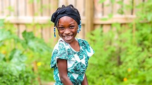 Georgia's youngest certified farmer presents the letter 'G' on Sesame Street