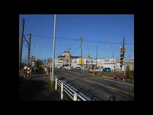 JR成田線の色々な踏切広告のある踏切