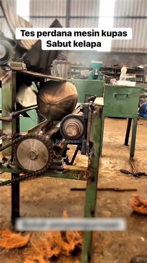 This machine removes the husk from the dry coconut.