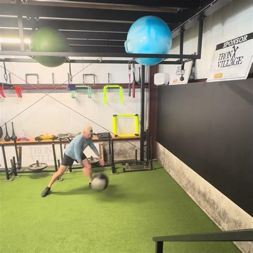 Rotational med ball wall throw (scoop toss)