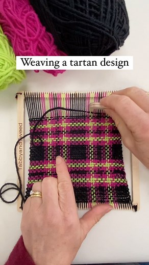 Weaving a Tartan design on a square frame weaving loom. This is a great activity to explore colours and designs. We often first weave a sample on a square loom before moving onto weaving a larger piece of fabric on a rigid heddle loom. Our weaving kits are available in our TabbyandTweed website shop for UK delivery and our TabbyandTweed Etsy shop for delivery elsewhere. #textiledesign #weavingloom #frameloom #tartan #weaving #weavingkit | TabbyandTweed