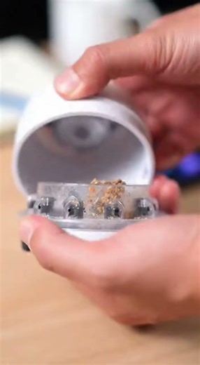 This tiny vacuum cleans your desk