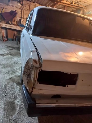 Restoring an Older Model Car in a Cluttered Garage