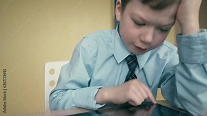 CU, Tracking: Pupil works on tablet computer, does lessons, flips through pages
