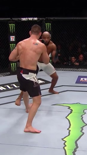 Flying Knee Knockout in UFC Fight: Yoel Romero vs. Opponent