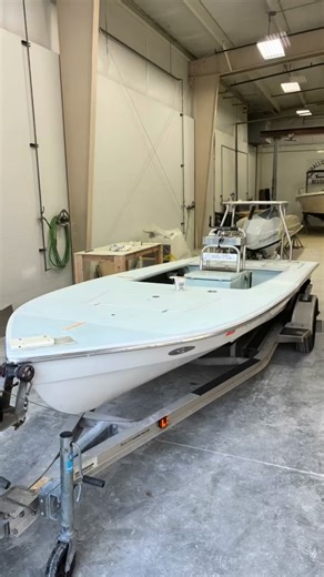Rory brought us his Waterman from South Florida to get the hull freshened up, the topside smooths buffed, some fresh nonskid, new under gunnel carpet, and some new upholstery. Making progress!💪🏼 . . . #shallowaterrestoration #custom #skifflife #hellsbayboatworks #hellsbayauthorizedserviceshop | Shallow Water Restoration