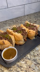 Bringing a Chicago classic to the kitchen: Slow cooker style! This is the Italian Beef Combo: a local favorite stacked with tender shredded beef, spicy giardiniera, and a juicy Italian sausage link, all packed into a crusty roll. Traditionally cooked low and slow in an herb-packed broth, it’s perfect for meal prep, game days, or feeding a hungry crowd. How do you like your Italian beef—dipped or dry? #LetsGetCravin #italianbeef #chicago #slowcooker #cookingathome #cookingtime #delicious #dinner 