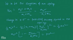 Two masses are connected by a spring as shown in the figure. On... | Filo