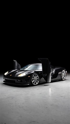 CURATED on Instagram: "Koenigsegg CCX: Chassis #046. Brought to life by the genius of Christian Von Koenigsegg, the 245 mph 6-speed manual CCX shattered speed records, earned glowing reviews, and became a legend after its iconic Top Gear debut, where it took its throne. Powered by an 800+hp twin-supercharged V8, Chassis #046 is one of the finest Koenigsegg CCX examples left in the world, in “as-new” condition showing only 360 miles. Finished in stunning Storm Black with exposed Carbon Fiber acce