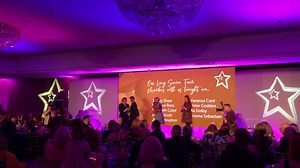 Tonight, we are also celebrating our long service colleagues who have reached 25 years’ service over the past year! Congratulations to you all! We are joined in the room by some of them, as the crowd cheers for their dedication to Voyage Care. | Voyage Care