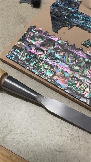 Abalone has long been prized in guitar building for its luminous beauty—shimmering blues, greens, and purples that catch the light like water itself. Some of the world’s most stunning abalone comes from New Zealand, where it’s known as pāua. At Breedlove, we honor this natural artistry by using abalone sparingly and thoughtfully—letting its iridescence frame a rosette, trace a binding, or highlight inlay work without overshadowing the wood’s voice. Each piece tells a story of ocean and earth, ca