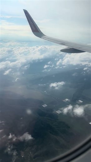 Stunning Airplane Window View - Free Download for Your Videos!