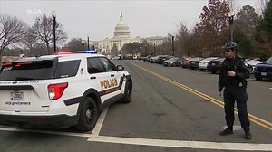 Armed man wearing tactical vest ran toward Capitol, apprehended by police