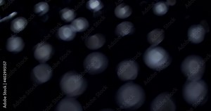 Letters and numbers on the keyboard very close in focus. Slow motion.