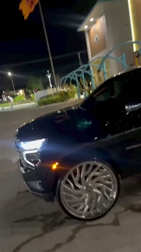 Black Chevy Suburban on 30’s