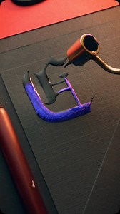 Comment a word using C 📜✨ • Oriandcalli Metallic inks, Fluid writer pen &Linen texture jet black paper • Speedball C-0 nib with straight holder | Calligraphy By Priyansh