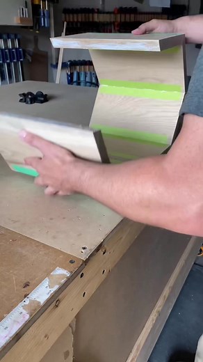 Strap clamps make gluing up angled cuts soooo much easier. #woodworking #woodshop #woodworker #woodworkersoftiktok #floatingshelves #honeycomb #glueup