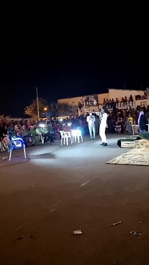 Nighttime Outdoor Event Showcasing Live Performances