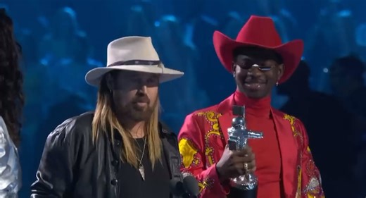 5 years ago, the fans gave me my first Moon Man for ‘Old Town Road’ with Lil Nas X at the MTV Video Music Awards, and I’m still blown away by the love and support y’all showed. Winning Best Song of the Year was a huge moment, and it’s all thanks to the fans who made it possible. I’ll always be grateful to everyone who rode with us on that journey. Got the horses in the back! Enjoy the #VMAs tonight! #oldtownroad 🙌🎶🐴 | Billy Ray Cyrus