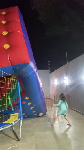 Inflatable Bounce House Topples After Adults Step Inside