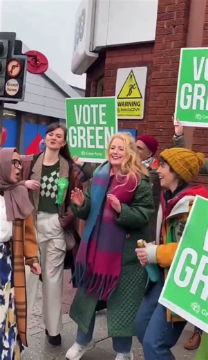 Green Party candidate dancing in streets of Manchester