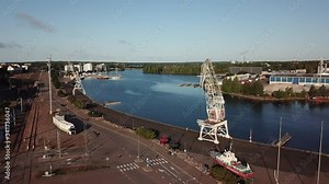 4K Kotka Baltic Sea Finnish Bay lagoon summer morning harbour aerial video, Kotka port and town over calm water channel in Finland-Suomi, northern Europe