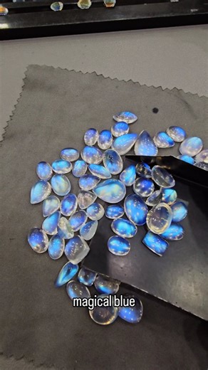 Labradorite King 👑 on Instagram: "Meet the finest Rainbow Moonstones — each one bursting with that electric blue flash. Every piece feels alive… glowing, shifting, shimmering with every angle. ✨ Nature’s own little light show. 🌙 #Moonstone"