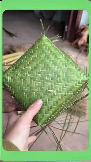 Making a basket from woven bamboo