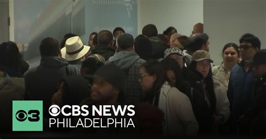 Early bird travelers head to Philadelphia International Airport for holiday travel