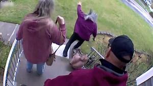 This family was standing on their porch ready to head out. They were engaged in a lighthearted conversation when the mother lost her footing and comically fell in the front yard. | Jukin Copyright Management