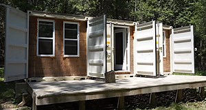 Shipping Container Turns Into Off-Grid, Low-Budget Cabin in the Woods