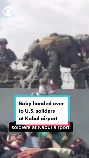 WATCH: A small, crying baby was passed over razor wire into the hands of a U.S. soldier guarding Kabul airport on Thursday. #afghanistan