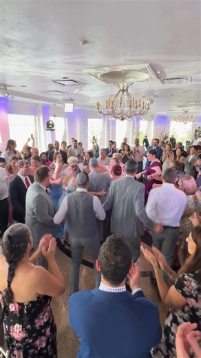 The circle of love gets bigger with every spin! The Hora dance is all about tradition, good vibes, and celebrating with the people who mean the most. #HoraDance #WeddingJoy #FamilyCelebration #DancingWithLove | Fete by Janina