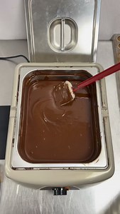 Hand capping our Salted Caramel bonbon @callebautchocolate - Chocolate @chocolateworldantwerp - Mold @martellato_official - Melter @andrewlogansconfections - Chocolatier! | Andrew Logans