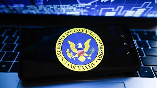 Climate protesters rush stage at Shell shareholder meeting