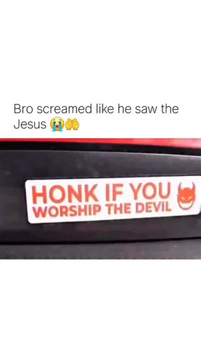 humourjoyusa on Instagram: "This clip is a prank video that combines two separate actions for a comedic effect. Summary of the Clip 1. The Setup: The video begins by showing a car with a provocative bumper sticker that reads: “HONK IF YOU WORSHIP THE DEVIL”. 2. The Prank: A car stops at an intersection next to a white utility van. • The driver of the van is seen pressing his hand on the horn (honk). • Immediately after the honk, someone (dressed like Jesus in a white robe and red sash) suddenly 