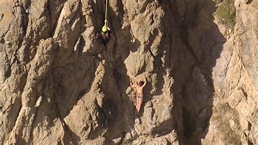 Rescue of woman clinging to cliff caught on camera