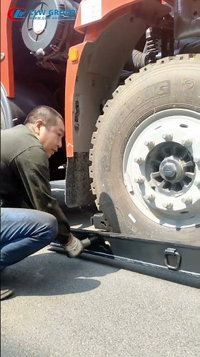 How to operate Euro-Style Tire Lift Grabber on Rear Underlift for Rotator Wrecker #emergencytowing