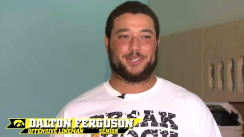 Iowa's 'Wave' gets a personal touch as Hawkeyes lineman waves toward newborn daughters