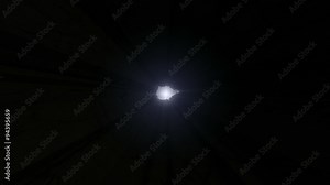A camera zoom into an infinitely deep hole in a flat piece of cracked stone reaching a blinding light on the other end