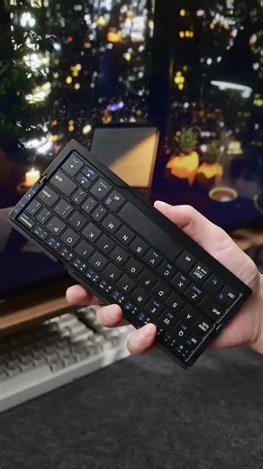 This wireless Bluetooth keyboard with touchpad makes work easier! ✨ Seamlessly switch between devices with precise and smooth operation. 🖱️ The ultra-thin foldable design fits easily into your bag, compatible with iOS, Android, and Windows, with stable connectivity up to 10m. 🖥️ Enjoy efficient typing anytime, anywhere—experience it now! 📱🎉 | Sakerplus