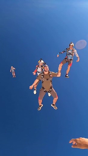 Experience the Thrill of Skydiving Through Clouds with Red Bull