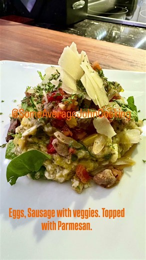 Sausage, egg and veggies topped with Parmesan cheese