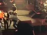 Rage Against the Machine guitarist Morello tackled by security guard on-stage