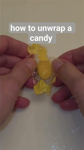 How to unwrap a candy 💡 #HowHands #howto #hands