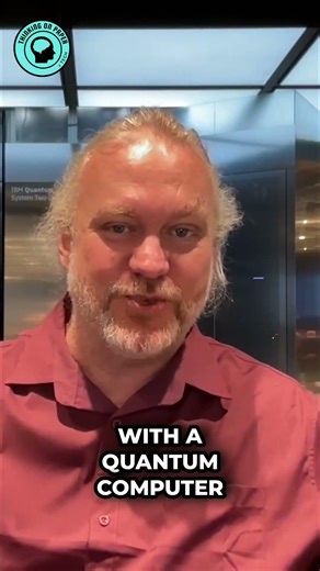Man Sits In Front Of Quantum Computer